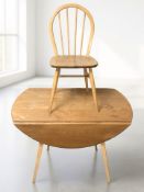 An Ercol light elm and beech drop leaf dining table, width 114 cm,