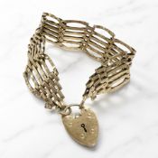 A 9ct gold padlock bracelet CONDITION REPORT: 22.