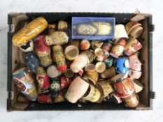 A box containing a quantity of Russian novelty dolls, etc.