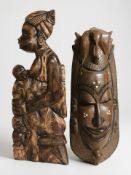 An African carved hardwood wall mask, height 60 cm,