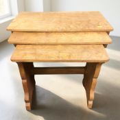 A Thomas 'Gnomeman' Whittaker adzed oak nest of three tables, largest 58 cm wide,