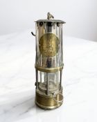 An Eccles Type GR6S brass and chrome miner's safety lamp.