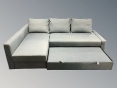 A contemporary L-shaped corner suite in grey fabric, length from the wall 220 cm.