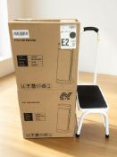 Two fan heaters in boxes and a metal step.