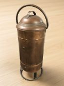 A large copper fire extinguisher