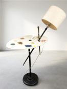 A Sintesi occasional table with lamp in the form of an artist's palette and brush, height 95 cm.