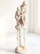 A contemporary composition statue in the form of children reading, height 113 cm.