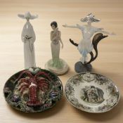 A group of ornaments and ceramics to include a Lladro figure of a nun, Majolica lobster plate,