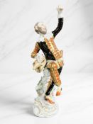 A Meissen porcelain figure of a harlequin, 20th century,