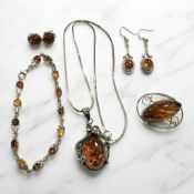 A sterling silver amber pendant on silver chain,