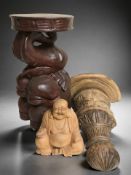Carved figure of Buddha, carved elephant plant stand and a carved wall bracket, height 48 cm.