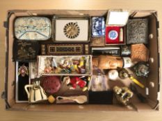 A box of miniature figures, tourist pieces, brass Buddha, paperweight,