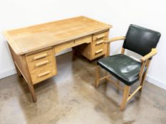 A mid-century Abbess oak twin-pedestal desk, 135 cm x 75 cm x 77 cm,