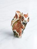 A Royal Crown Derby porcelain Woodland Squirrel paperweight, gold stopper.