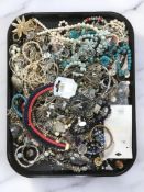 A large quantity of costume bead necklaces, simulated pearls, bangles, etc.