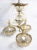 A contemporary gilt metal mounted chandelier, height 48 cm.