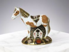 A Royal Crown Derby Epsom Filly figure No. 271 of 500, gold stopper.