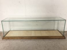 A rectangular glazed display case, width 66 cm.