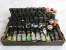 A large quantity of Lynx body sprays and other men's cosmetics.