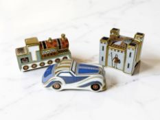 Three Royal Crown Derby Treasures of Childhood paperweights 'Steam Train', 'Car' and 'Fort'.