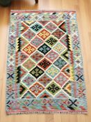 A Chobi Kilim rug, 144 cm x 103 cm.