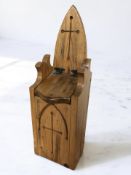 A gothic-style pine candle box, height 52 cm.