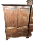 A Regency style mahogany linen press, late 19th century, with two door cabinet,
