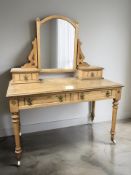 A Victorian Aesthetic period oak and parquetry inlaid mirror back two drawer dressing table,