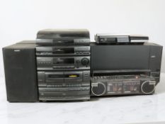 A Sony hi-fi system, various speakers, Bose speaker, a Saisho Beatmaster twin cassette stereo radio,