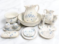 A group of floral transfer printed dressing table ceramics, wash jugs and basins,