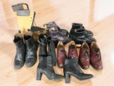 Several pairs of shoes including four pairs of Dr Martens shoes and boots.