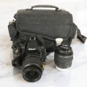 A Nikon D5200 DSLR camera, with Nikon ED 18-55mm lens, a further Nikon AF/S Nikkor 18-55mm lens,