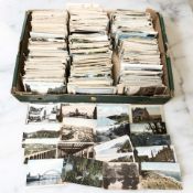 A large quantity of antique and vintage monochrome and colour postcards including North-East
