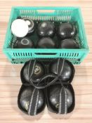 A quantity of lawn bowls.