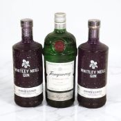 Two bottles of Whitley Neill rhubarb and ginger gin, 70cl, and a bottle of Tanqueray London dry gin,