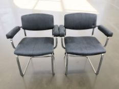 A pair of chrome framed cantilever armchairs in the style of Marcel Breuer, width 64 cm.
