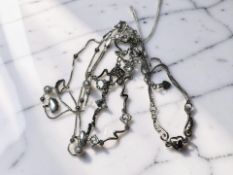 Three assorted modern silver bracelets.