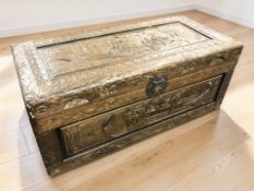 An oriental carved camphor wood blanket box, 88 cm x 42 cm x 36 cm.