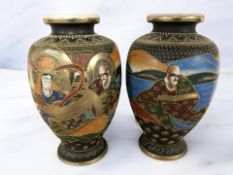 A pair of 20th century Japanese satsuma ovoid vases, height 37 cm.
