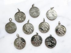 Ten silver disc pendants CONDITION REPORT: 30g