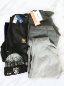 New clothing including Adidas tracksuit bottoms, a Berghaus hybrid jacket, a Raiders bobble hat,