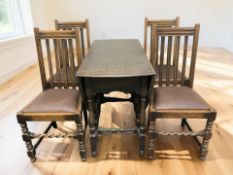 An Edwardian oak gateleg drop leaf table, width 106 cm, together with a set of four chairs.