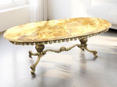 A brass and onyx oval coffee table,