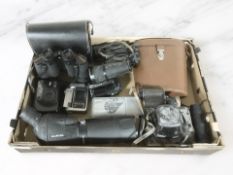 A pair of Prinz 10x50 binoculars, an Auriol spotting scope, Alma 12x50 comet binoculars,
