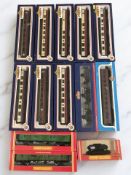 Thirteen various pieces of Hornby, Bachmann and Airfix OO gauge rolling stock.