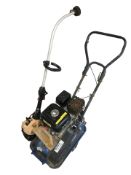 A Scheppach petrol plate compacter, and a JCB petrol strimmer.