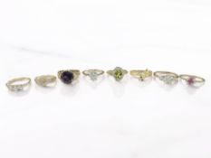Eight silver-gilt gem set dress rings including one in the form of a snake
