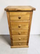 A modern pine five drawer chest, 51 cm x 35 cm x 105 cm.