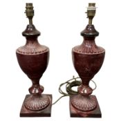 A pair of modern patinated metal urn-shaped table lamps,