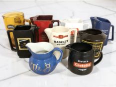 Nine various ceramic and glass jugs and tankards bearing advertising, Tia Maria, etc.